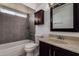 Updated bathroom with modern fixtures, stylish vanity, and tiled shower and tub at 2233 W Oraibi Dr, Phoenix, AZ 85027