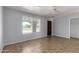 Bedroom with window and closet in neutral tones and tiled flooring at 2233 W Oraibi Dr, Phoenix, AZ 85027