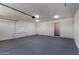 Spacious garage with ample room for parking and storage at 2233 W Oraibi Dr, Phoenix, AZ 85027
