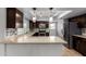 Modern kitchen featuring stainless steel appliances, sleek countertops, and stylish backsplash at 2233 W Oraibi Dr, Phoenix, AZ 85027