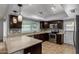 Modern kitchen featuring stainless steel appliances, sleek countertops, and stylish backsplash at 2233 W Oraibi Dr, Phoenix, AZ 85027