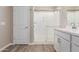 Modern bathroom featuring a glass enclosed shower with wood style tile at 22863 N 183Rd Dr, Surprise, AZ 85387