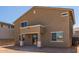 Exterior of stucco house featuring a covered patio and ample windows providing plenty of natural light at 22863 N 183Rd Dr, Surprise, AZ 85387