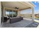 Relaxing covered patio with comfortable seating and views, perfect for outdoor entertaining at 26824 W Ponderosa Ln, Buckeye, AZ 85396