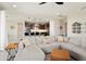 Open-concept living space flows into the kitchen, creating a great space for entertaining and modern living at 26824 W Ponderosa Ln, Buckeye, AZ 85396