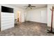 An empty bedroom offers lots of space and features a private ensuite bathroom and walk-in closet at 2721 N 107Th Dr, Avondale, AZ 85392