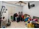 A bedroom is full of clutter and needs to be cleaned at 2721 N 107Th Dr, Avondale, AZ 85392