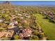 Stunning home nestled among lush desert landscaping near a golf course with mountain views at 28768 N 95Th Way, Scottsdale, AZ 85262