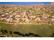 Aerial view of Southwestern home on golf course with red pin location marker at 28768 N 95Th Way, Scottsdale, AZ 85262