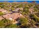 Beautiful hillside home featuring a tile roof, desert landscaping, and a relaxing private pool at 28768 N 95Th Way, Scottsdale, AZ 85262