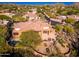Well maintained desert home featuring an open patio and swimming pool surrounded by mature landscaping at 28768 N 95Th Way, Scottsdale, AZ 85262