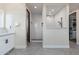 Bright bathroom features an open walk-in shower with white subway tile and black hardware at 28768 N 95Th Way, Scottsdale, AZ 85262