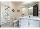 Stylish bathroom featuring modern fixtures, a glass shower, and fun decor in a bright space at 28768 N 95Th Way, Scottsdale, AZ 85262