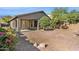 The back yard has a small patio with gravel ground and a block wall at 3013 W Via De Pedro Miguel --, Phoenix, AZ 85086
