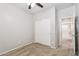 Bedroom with carpet, ceiling fan, and a closet with sliding doors at 3013 W Via De Pedro Miguel --, Phoenix, AZ 85086
