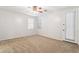 Bedroom with carpet, neutral walls, ceiling fan, and outdoor access at 3013 W Via De Pedro Miguel --, Phoenix, AZ 85086
