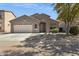 Charming single-story home with a two-car garage and low maintenance desert landscaping at 3013 W Via De Pedro Miguel --, Phoenix, AZ 85086
