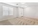 Bright living room with new carpet, neutral paint, and abundant natural light throughout at 3013 W Via De Pedro Miguel --, Phoenix, AZ 85086