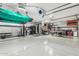 Well organized garage with work area, plenty of storage, and room for hobbies at 3054 E Norwood St, Mesa, AZ 85213