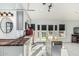 Stylish kitchen with white subway tile backsplash, butcher block island, and stainless steel appliances at 3054 E Norwood St, Mesa, AZ 85213