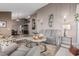 Elegant living room with a neutral color palette, two sofas, area rug, and modern decor at 3054 E Norwood St, Mesa, AZ 85213