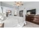 Bright and cozy main bedroom featuring a walk-in closet and en-suite bathroom at 3054 E Norwood St, Mesa, AZ 85213