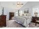 Calming main bedroom with vaulted ceiling, ceiling fan and dresser at 3054 E Norwood St, Mesa, AZ 85213