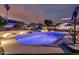 Beautiful backyard pool and spa, with manicured landscaping and outdoor seating area at 3054 E Norwood St, Mesa, AZ 85213