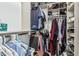 Spacious walk-in closet with shelving, hanging racks, and ample storage for clothes and accessories at 3054 E Norwood St, Mesa, AZ 85213
