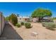 The backyard shows the low maintenance desert landscape at 3118 W Aster Dr, Phoenix, AZ 85029