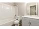 Bright bathroom featuring a tub and vanity with cabinet at 3118 W Aster Dr, Phoenix, AZ 85029
