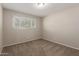 Neutral bedroom with a window allowing natural light at 3118 W Aster Dr, Phoenix, AZ 85029