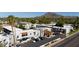 Beautiful condominium complex exterior with well-maintained landscaping and picturesque mountain views at 3314 N 68Th St # 129, Scottsdale, AZ 85251