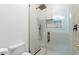 Walk-in shower with stylish tile and glass doors offers a luxurious and modern bathing experience at 3354 E Jaeger Cir, Mesa, AZ 85213