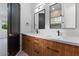 Bathroom boasts double sinks, modern fixtures, and ample counter space in this contemporary design at 3354 E Jaeger Cir, Mesa, AZ 85213