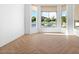 Bedroom with hardwood flooring and backyard views at 3354 E Jaeger Cir, Mesa, AZ 85213