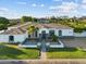 Beautiful single-story home with a well-manicured front yard and desert landscaping at 3354 E Jaeger Cir, Mesa, AZ 85213