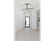 Foyer features modern light fixture and tile flooring at 3354 E Jaeger Cir, Mesa, AZ 85213