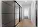 Hallway with mirrored closet doors and stylish herringbone wood flooring provides a modern aesthetic at 3354 E Jaeger Cir, Mesa, AZ 85213
