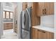 Modern kitchen showcasing stainless steel appliances, custom cabinets, and marble countertops at 3354 E Jaeger Cir, Mesa, AZ 85213