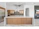Open kitchen with stainless steel appliances, large island, and custom cabinetry at 3354 E Jaeger Cir, Mesa, AZ 85213