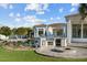 Amazing outdoor kitchen and dining area, with a pool and lush lawn, perfect for entertaining at 3354 E Jaeger Cir, Mesa, AZ 85213