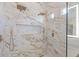 Opulent shower featuring marble walls, rainfall showerheads, handheld wand, and built-in niche at 3354 E Jaeger Cir, Mesa, AZ 85213