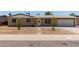 Charming single-story home featuring a well-maintained brick facade, attached garage, and minimal landscaping at 3539 W Davidson Ln, Phoenix, AZ 85051
