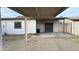 The backyard offers a covered patio area, ideal for enjoying the outdoors in comfort and style at 4217 W Medlock Dr, Phoenix, AZ 85019