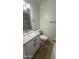 Bathroom featuring a granite vanity and tile flooring at 4217 W Medlock Dr, Phoenix, AZ 85019