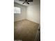 Bedroom featuring tile flooring, white walls, and a window at 4217 W Medlock Dr, Phoenix, AZ 85019