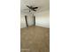 Bedroom featuring tile flooring, white walls, and a ceiling fan at 4217 W Medlock Dr, Phoenix, AZ 85019