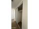 A closet with sliding doors and shelving, offering practical storage solutions for easy organization at 4217 W Medlock Dr, Phoenix, AZ 85019