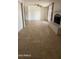 Spacious and open-concept living area that provides a warm and inviting space for relaxation and entertainment at 4217 W Medlock Dr, Phoenix, AZ 85019